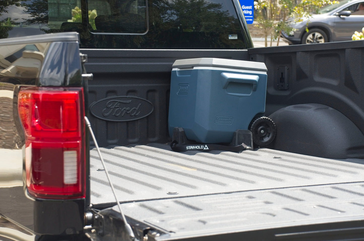 Stayhold CARGO WEDGE 2-PACK + TETHER. (Solid Rubber Cargo Chocks) in truck holding cooler